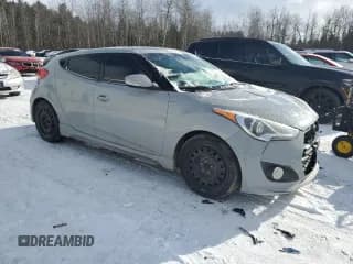✅ 2013 Hyundai Veloster Turbo • VIN: KMHTC6AE7DU152093 • Lot: 87879405. Wystawiony na Copart z przebiegiem 241 772 mil. Bezpłatny archiwum sprzedaży aukcyjnych z USA i szczegółowy raport historii pojazdu na DreamBid. Zdjęcie 4.