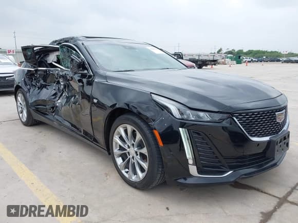 ✅ 2023 Cadillac CT5 Premium Luxury • VIN: 1G6DN5RK7P0119990 • Лот: 42293014. Опубликован ранее на IAAI с пробегом 44 690 миль. Бесплатный доступ к архиву аукционных продаж из США и подробный отчёт об истории автомобиля на DreamBid. Изображение 1.