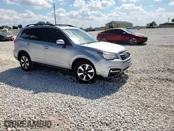 2017 Subaru Forester Limited with VIN JF2SJALC7HH442418, listed as a Copart auction lot 82584035 with 57,114 mi miles and Salvage title. Bid and sale history available at DreamBid. Image 14.
