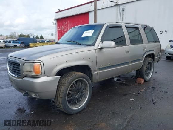 ✅ 1999 Cadillac Escalade • VIN: 1GYEK13R4XR410963 • Lot: 40599113. Listed on IAAI with 191,751 mi. Free auction sales archive from the USA and detailed vehicle history report at DreamBid. Image 2.