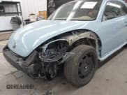 ✅ 2014 Volkswagen Beetle 1.8T • VIN: 3VWJ17ATXEM663919 • Лот: 42549863. Опубликован ранее на IAAI с пробегом 67 987 миль. Бесплатный доступ к архиву аукционных продаж из США и подробный отчёт об истории автомобиля на DreamBid. Изображение 6.