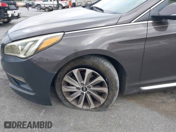 2015 Hyundai Sonata Sport z VIN 5NPE34AF4FH022103, wystawiony jako IAAI lot #43426151 z przebiegiem 253 062 mil mil oraz . Historia ofert i sprzedaży dostępna na DreamBid. Obrazek 12.