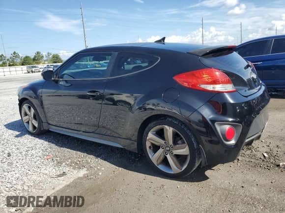 2013 Hyundai Veloster Turbo с VIN KMHTC6AE8DU178833, выставлен на аукционе Copart как лот 61944125 с пробегом 149 564 миль миль и Списание • Salvage title. История ставок и продаж доступна на DreamBid. Изображение 2.