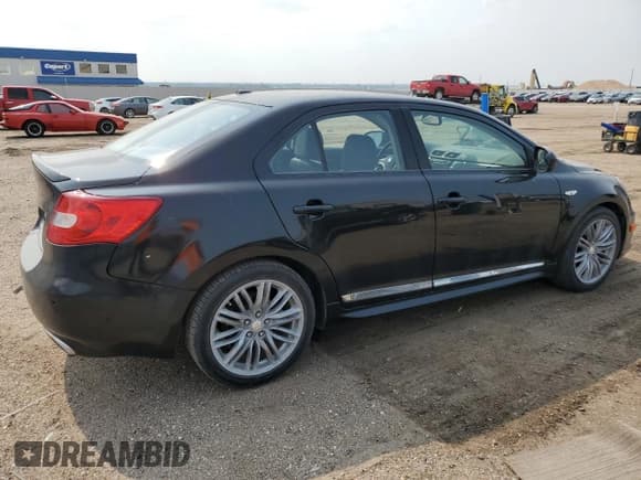 ✅ 2012 Suzuki Kizashi SLS Sport • VIN: JS2RF9A84C6101161 • Лот: 59851795. Опубликован ранее на Copart с пробегом 115 333 миль. Бесплатный доступ к архиву аукционных продаж из США и подробный отчёт об истории автомобиля на DreamBid. Изображение 3.