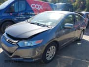 ✅ 2012 Honda Insight • VIN: JHMZE2H37CS006159 • Lot: 43380789. Listed on IAAI with 182,815 mi. Free auction sales archive from the USA and detailed vehicle history report at DreamBid. Image 2.