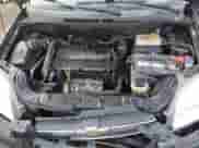 2011 Chevrolet Aveo 1LT z VIN KL1TD5DE3BB138117, wystawiony jako Copart lot #86677124 z przebiegiem 77 642 mil mil oraz Szkoda całkowita • Salvage title. Historia ofert i sprzedaży dostępna na DreamBid. Obrazek 12.