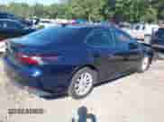 2021 Toyota Camry LE with VIN 4T1C11AK8MU461036, listed as a IAAI auction lot 43351796 with 83,856 mi miles and . Bid and sale history available at DreamBid. Image 4.