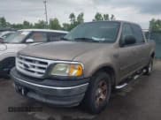 ✅ 2003 Ford F-150 XLT • VIN: 1FTRW07693KC89081 • Lot: 43020148. Wystawiony na IAAI z przebiegiem 215 580 mil. Bezpłatny archiwum sprzedaży aukcyjnych z USA i szczegółowy raport historii pojazdu na DreamBid. Zdjęcie 2.