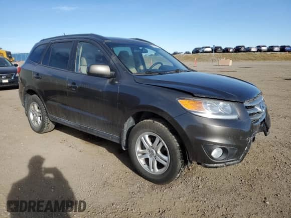 2012 Hyundai Santa Fe GLS with VIN 5XYZGDAG7CG144858, listed as a Copart auction lot 89706175 with 219,169 mi miles and Salvage title. Bid and sale history available at DreamBid. Image 4.