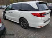 ✅ 2018 Honda Odyssey Elite • VIN: 5FNRL6H92JB028423 • Лот: 54118045. Опубликован ранее на Copart с пробегом 70 026 миль. Бесплатный доступ к архиву аукционных продаж из США и подробный отчёт об истории автомобиля на DreamBid. Изображение 2.