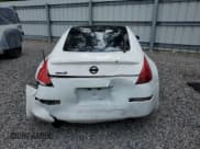 ✅ 2006 Nissan 350Z Touring • VIN: JN1AZ34D16M304368 • Lot: 64277205. Wystawiony na Copart z przebiegiem 157 707 mil. Bezpłatny archiwum sprzedaży aukcyjnych z USA i szczegółowy raport historii pojazdu na DreamBid. Zdjęcie 6.