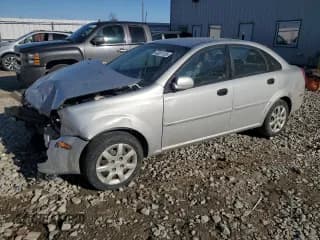 ✅ 2005 Suzuki Forenza S • VIN: KL5JD56Z95K119565 • Lot: 43051135. Wystawiony na Copart z przebiegiem 143 172 mil. Bezpłatny archiwum sprzedaży aukcyjnych z USA i szczegółowy raport historii pojazdu na DreamBid. Zdjęcie 1.