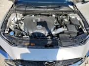 ✅ 2022 Mazda 3 Select • VIN: 3MZBPABL1NM306076 • Лот: 81376845. Опубликован ранее на Copart с пробегом 25 973 миль. Бесплатный доступ к архиву аукционных продаж из США и подробный отчёт об истории автомобиля на DreamBid. Изображение 11.