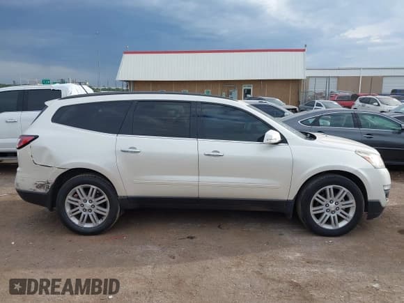 ✅ 2014 Chevrolet Traverse LT • VIN: 1GNKVGKD6EJ165854 • Lot: 42860430. Wystawiony na IAAI z przebiegiem 185 264 mil. Bezpłatny archiwum sprzedaży aukcyjnych z USA i szczegółowy raport historii pojazdu na DreamBid. Zdjęcie 13.