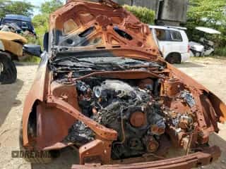 2013 Hyundai Genesis Coupe R-Spec с VIN KMHHU6KJ2DU109750, выставлен на аукционе Copart как лот 63877074 с пробегом Не указан миль и На запчасти • Non repairable. История ставок и продаж доступна на DreamBid. Изображение 5.