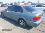 ✅ 2000 Honda Civic VP • VIN: 2HGEJ6612YH585436 • Lot: 42974673. Listed on IAAI with 241,051 mi. Free auction sales archive from the USA and detailed vehicle history report at DreamBid. Image 3.