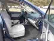 2014 Subaru Forester 2.5i with VIN JF2SJAACXEH439012, listed as a IAAI auction lot 43337376 with 148,553 mi miles and . Bid and sale history available at DreamBid. Image 5.