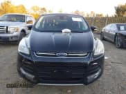 ✅ 2015 Ford Escape Titanium • VIN: 1FMCU9J96FUB23219 • Lot: 43695680. Listed on IAAI with 146,990 mi. Free auction sales archive from the USA and detailed vehicle history report at DreamBid. Image 12.