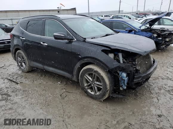 ✅ 2018 Hyundai Santa Fe 2.4L • VIN: 5XYZUDLBXJG555436 • Lot: 38876983. Wystawiony na Copart z przebiegiem 102 667 mil mil. Skorzystaj z bezpłatnego archiwum sprzedaży aukcyjnych z USA i zobacz szczegółowy raport historii pojazdu na DreamBid. Zdjęcie 4.