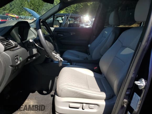 ✅ 2021 Honda Passport Touring • VIN: 5FNYF8H92MB042258 • Lot: 68150945. Listed on Copart with 60,684 mi. Free auction sales archive from the USA and detailed vehicle history report at DreamBid. Image 7.