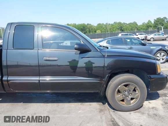 2006 Dodge Dakota SLT with VIN 1D7HE42NX6S666354, listed as a IAAI auction lot 42394779 with 124,633 mi miles and . Bid and sale history available at DreamBid. Image 12.