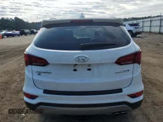 ✅ 2018 Hyundai Santa Fe 2.0T • VIN: 5NMZU4LA9JH073926 • Лот: 58314864. Опубликован ранее на Copart с пробегом 59 819 миль. Бесплатный доступ к архиву аукционных продаж из США и подробный отчёт об истории автомобиля на DreamBid. Изображение 6.