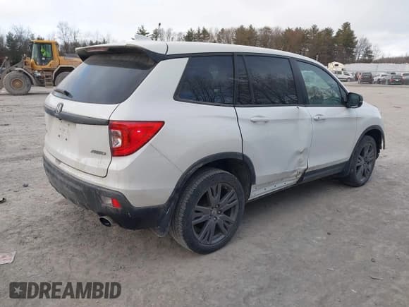 ✅ 2021 Honda Passport EX-L • VIN: 5FNYF8H55MB004813 • Lot: 41262942. Listed on IAAI with 69,585 mi. Free auction sales archive from the USA and detailed vehicle history report at DreamBid. Image 4.