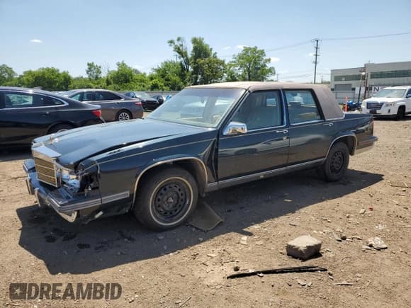 ✅ 1987 Cadillac DeVille • VIN: 1G6CD5180H4239140 • Lot: 61236165. Listed on Copart with 36,668 mi. Free auction sales archive from the USA and detailed vehicle history report at DreamBid. Image 1.