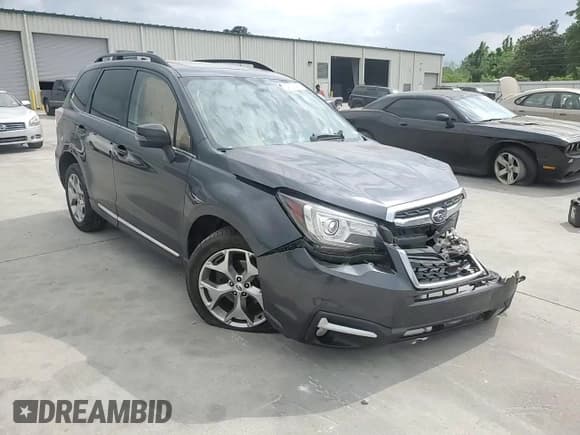 ✅ 2017 Subaru Forester Touring • VIN: JF2SJAWC4HH467501 • Lot: 54208465. Listed on Copart with 128,999 mi. Free auction sales archive from the USA and detailed vehicle history report at DreamBid. Image 13.