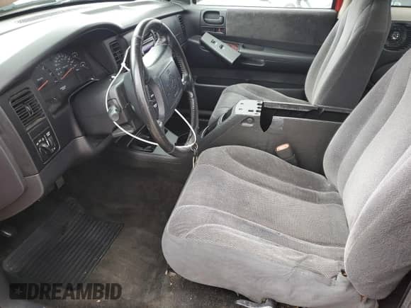 2003 Dodge Dakota SLT with VIN 1D7HL42N93S105421, listed as a Copart auction lot 83088264 with 210,194 mi miles and Salvage title. Bid and sale history available at DreamBid. Image 7.