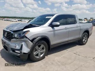 ✅ 2021 Honda Ridgeline RTL-E • VIN: 5FPYK3F73MB008806 • Lot: 62234825. Wystawiony na Copart z przebiegiem 84 716 mil. Bezpłatny archiwum sprzedaży aukcyjnych z USA i szczegółowy raport historii pojazdu na DreamBid. Zdjęcie 1.