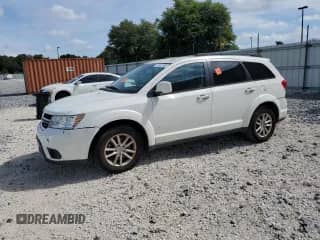 2015 Dodge Journey SXT z VIN 3C4PDCBB6FT627624, wystawiony jako Copart lot #71982165 z przebiegiem 176 109 mil mil oraz Szkoda całkowita • Salvage title. Historia ofert i sprzedaży dostępna na DreamBid. Obrazek 1.