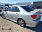 ✅ 2004 Toyota Corolla CE • VIN: 1NXBR32E14Z203918 • Lot: 43013302. Listed on IAAI with 244,429 mi. Free auction sales archive from the USA and detailed vehicle history report at DreamBid. Image 3.