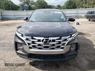 2023 Hyundai Santa Cruz SE z VIN 5NTJADAE7PH065378, wystawiony jako Copart lot #64591924 z przebiegiem 31 815 mil mil oraz Szkoda całkowita • Salvage title. Historia ofert i sprzedaży dostępna na DreamBid. Obrazek 5.