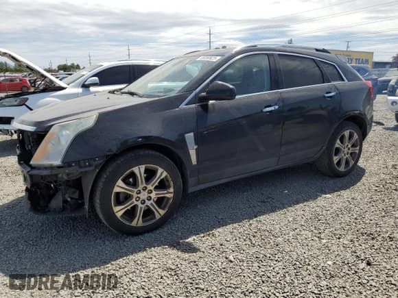 ✅ 2012 Cadillac SRX Performance Collection • VIN: 3GYFNEE39CS626584 • Lot: 55050825. Listed on Copart with 165,114 mi. Free auction sales archive from the USA and detailed vehicle history report at DreamBid. Image 1.