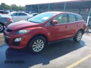 ✅ 2012 Mazda CX-7 i SV • VIN: JM3ER2A52C0411784 • Lot: 43091579. Wystawiony na IAAI z przebiegiem 289 673 mil. Bezpłatny archiwum sprzedaży aukcyjnych z USA i szczegółowy raport historii pojazdu na DreamBid. Zdjęcie 2.