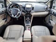 ✅ 2017 Ford Fiesta Titanium • VIN: 3FADP4FJ3HM109507 • Lot: 87182664. Listed on Copart with 105,198 mi. Free auction sales archive from the USA and detailed vehicle history report at DreamBid. Image 8.