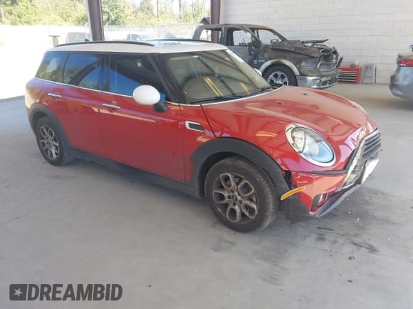 ✅ 2016 MINI Clubman • VIN: WMWLN5C5XG2E07275 • Lot: 42749360. Listed on IAAI with 79,036 mi. Free auction sales archive from the USA and detailed vehicle history report at DreamBid. Image 1.