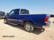 ✅ 1998 Ford F-150 • VIN: 1FTZX1728WKA22003 • Lot: 61235875. Listed on Copart with 185,013 mi. Free auction sales archive from the USA and detailed vehicle history report at DreamBid. Image 2.