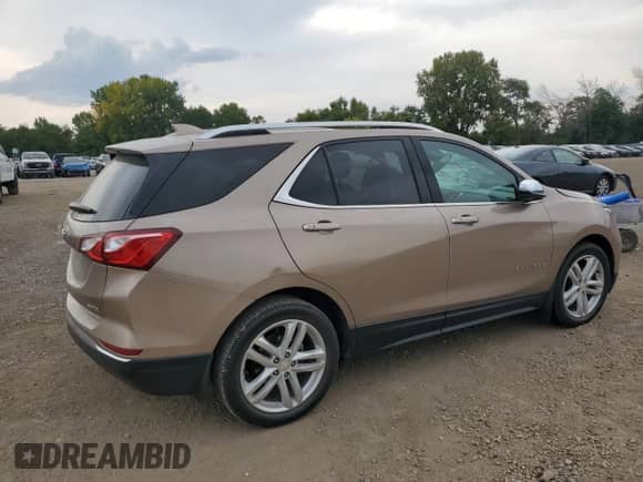 2018 Chevrolet Equinox Premier z VIN 3GNAXMEV5JL352725, wystawiony jako Copart lot #81042215 z przebiegiem 72 179 mil mil oraz Szkoda całkowita • Salvage title. Historia ofert i sprzedaży dostępna na DreamBid. Obrazek 3.
