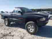 2002 Dodge Dakota Sport z VIN 1B7FL36X42S669287, wystawiony jako Copart lot #77607224 z przebiegiem 112 334 mil mil oraz Czysty tytuł • Clean title. Historia ofert i sprzedaży dostępna na DreamBid. Obrazek 4.