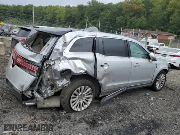 ✅ 2012 Lincoln MKT EcoBoost • VIN: 2LMHJ5AT6CBL52802 • Лот: 71015614. Опубликован ранее на Copart с пробегом 143 167 миль. Бесплатный доступ к архиву аукционных продаж из США и подробный отчёт об истории автомобиля на DreamBid. Изображение 3.