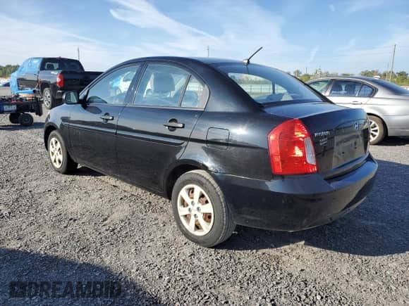 2010 Hyundai Accent GL z VIN KMHCN4BC3AU467108, wystawiony jako Copart lot #81237345 z przebiegiem 143 596 mil mil oraz Czysty tytuł • Clean title. Historia ofert i sprzedaży dostępna na DreamBid. Obrazek 2.