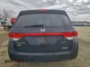 ✅ 2014 Honda Odyssey Touring • VIN: 5FNRL5H90EB094582 • Lot: 93588585. Listed on Copart with 148,694 mi. Free auction sales archive from the USA and detailed vehicle history report at DreamBid. Image 6.