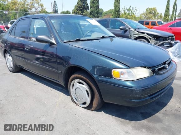✅ 1999 Toyota Corolla VE • VIN: 1NXBR12E4XZ251809 • Lot: 42910359. Listed on IAAI with 150,200 mi. Free auction sales archive from the USA and detailed vehicle history report at DreamBid. Image 1.