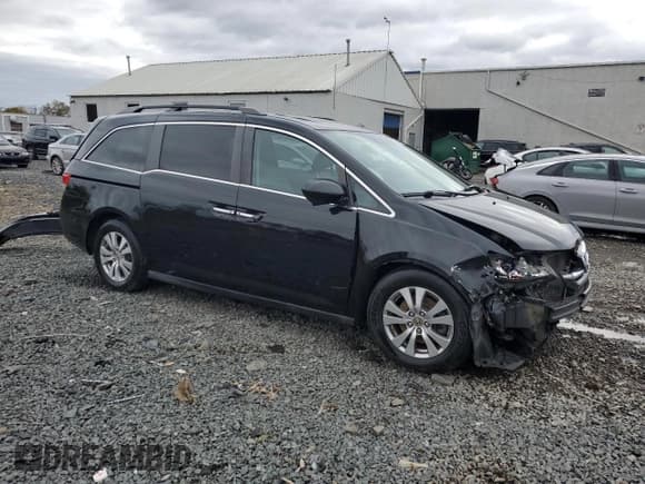 ✅ 2014 Honda Odyssey EX-L • VIN: 5FNRL5H66EB014143 • Lot: 90998015. Listed on Copart with 137,281 mi. Free auction sales archive from the USA and detailed vehicle history report at DreamBid. Image 4.