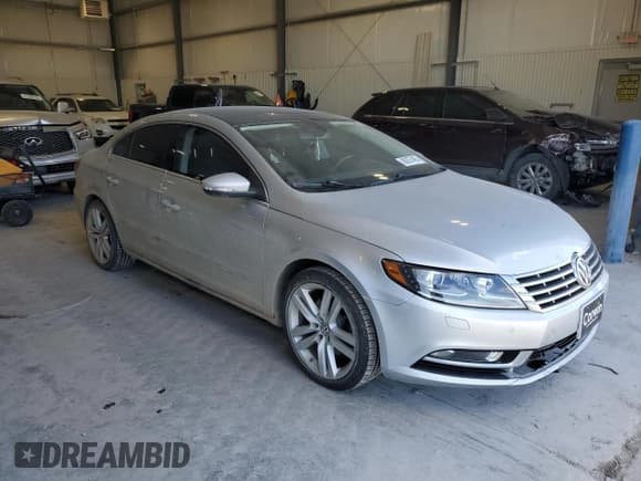 ✅ 2014 Volkswagen CC Executive • VIN: WVWRN7AN6EE524274 • Lot: 88057495. Listed on Copart with 112,058 mi. Free auction sales archive from the USA and detailed vehicle history report at DreamBid. Image 4.