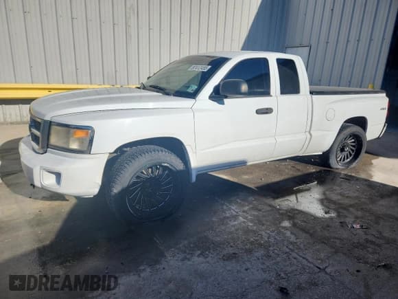 ✅ 2008 Dodge Dakota SLT • VIN: 1D7HW42N48S590906 • Лот: 87412455. Опубликован ранее на Copart с пробегом 148 988 миль. Бесплатный доступ к архиву аукционных продаж из США и подробный отчёт об истории автомобиля на DreamBid. Изображение 1.