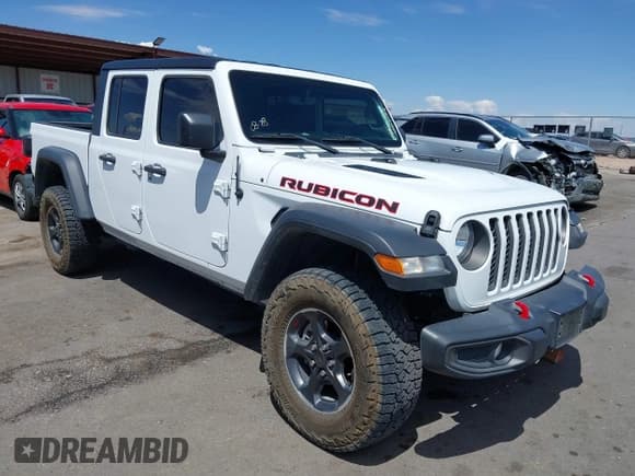 ✅ 2023 Jeep Gladiator Rubicon • VIN: 1C6JJTBG1PL556864 • Lot: 43084912. Listed on IAAI with 19,618 mi. Free auction sales archive from the USA and detailed vehicle history report at DreamBid. Image 1.