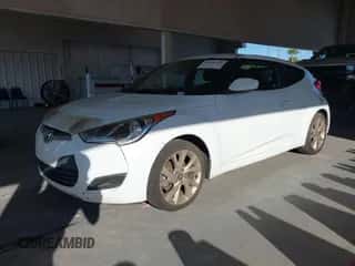 2016 Hyundai Veloster z VIN KMHTC6AD8GU269483, wystawiony jako IAAI lot #43445704 z przebiegiem 121 575 mil mil oraz . Historia ofert i sprzedaży dostępna na DreamBid. Obrazek 2.